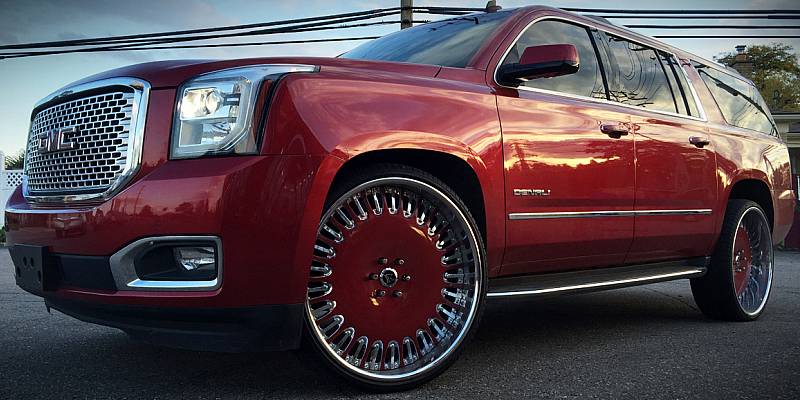 GMC Denali on Dark Red Rucci Milidario Wheels